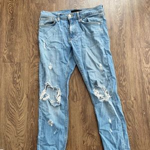 Men skinny jeans light blue with distressed. Size 30